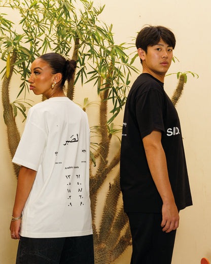 T-shirt streetwear en coton pour homme et femme avec écriture en arabe au dos de la marque side shirt.